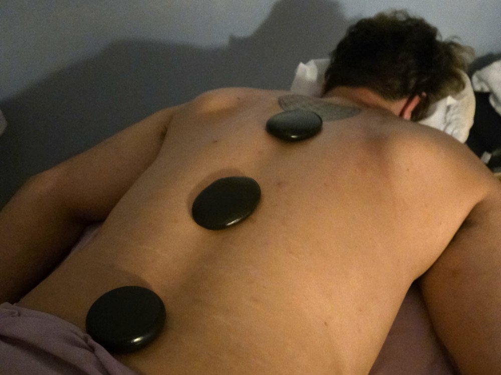 Hot stone therapy at Heavenly Therapeutic Massage